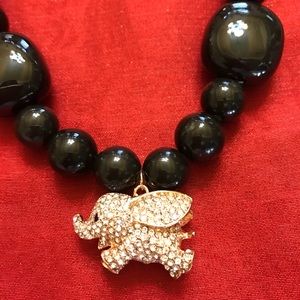 Handmade elephant statement necklace.